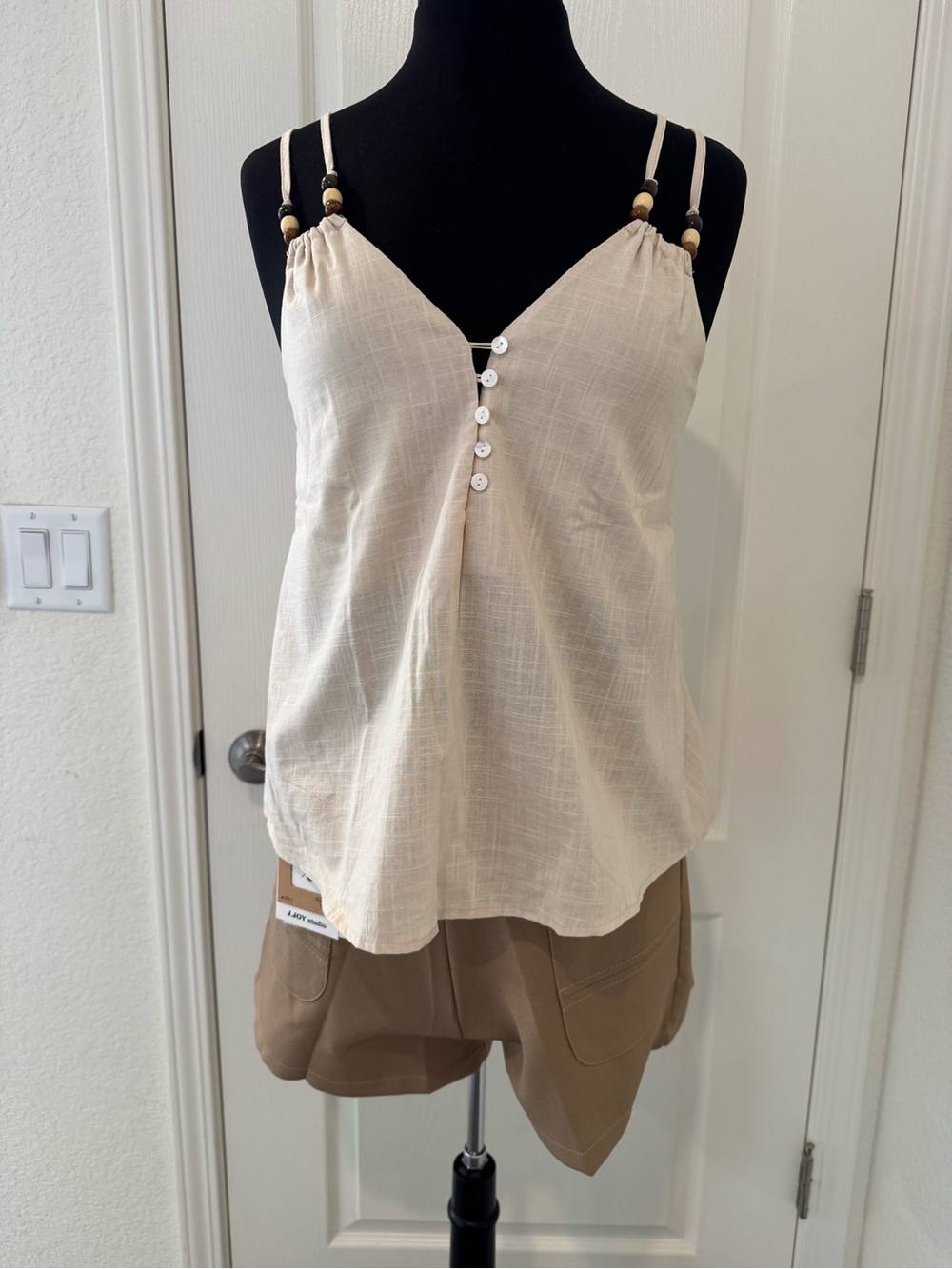 Cream Spaghetti Strap Button-Front Top and Brown Shorts with Belt